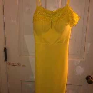 Yellow off the shoulder dress.